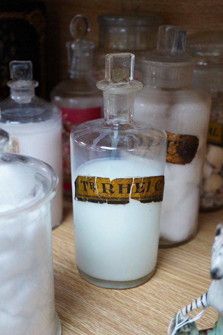 A collection of glass vessels to include Royal Yacht Cologne, three 19th century drug jars etc, (9).